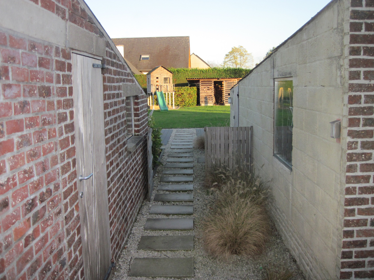 Degelijke én gezellige woning. Met tuin en met garage. 