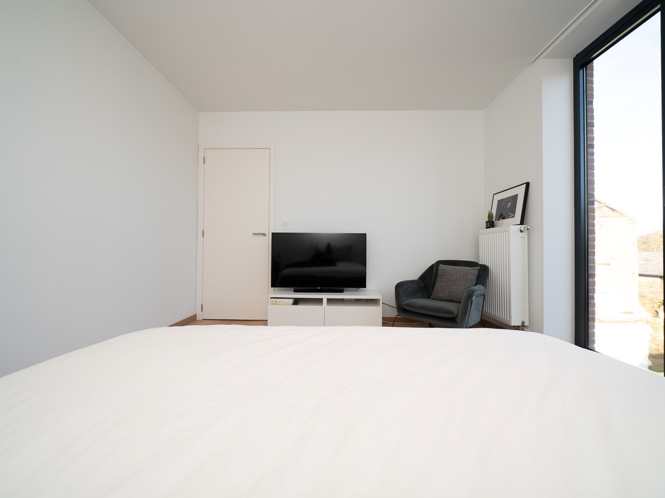 Recent 2-kamer appartement met terras, parking en kelder 