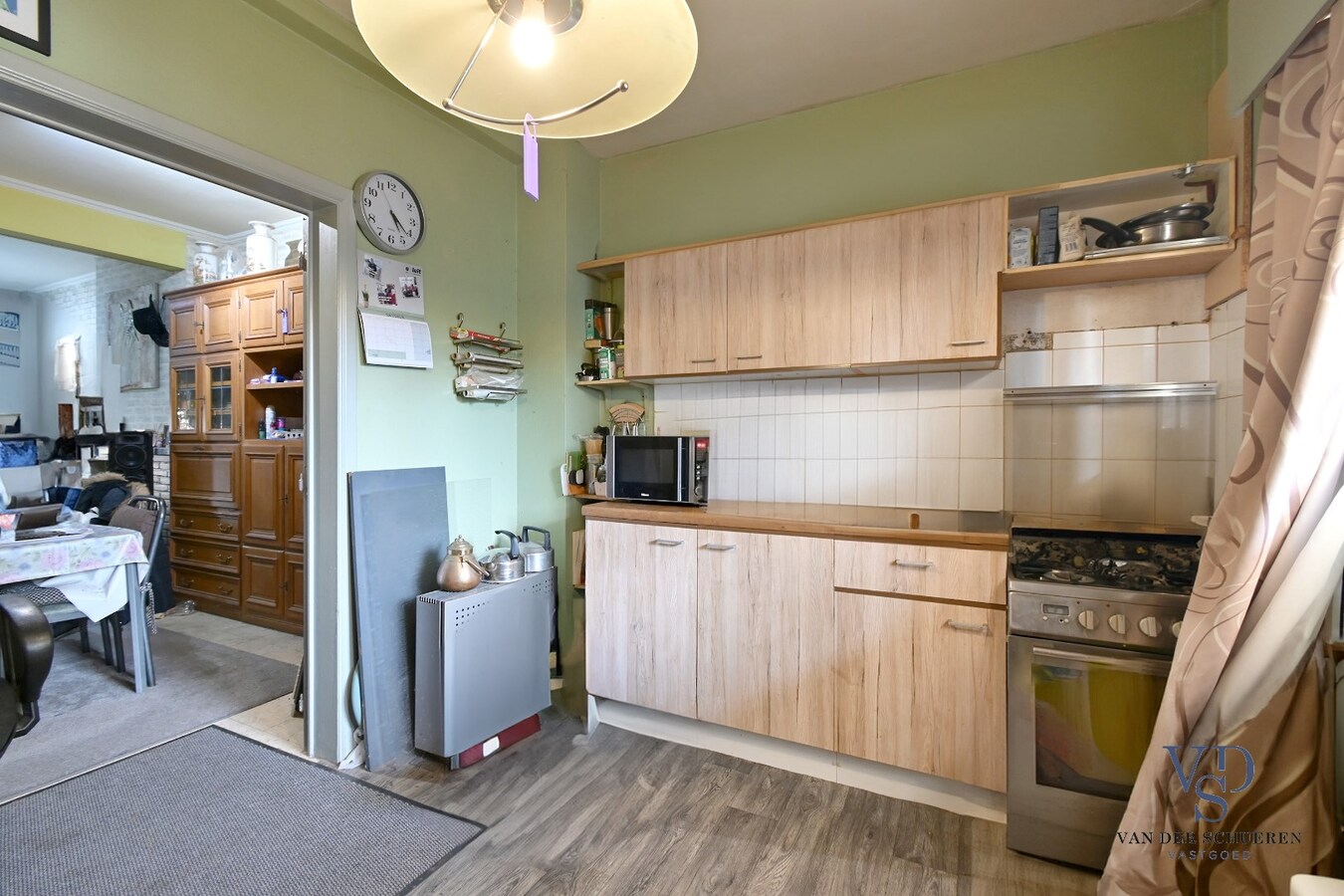 Woning met tuin - te renoveren. 