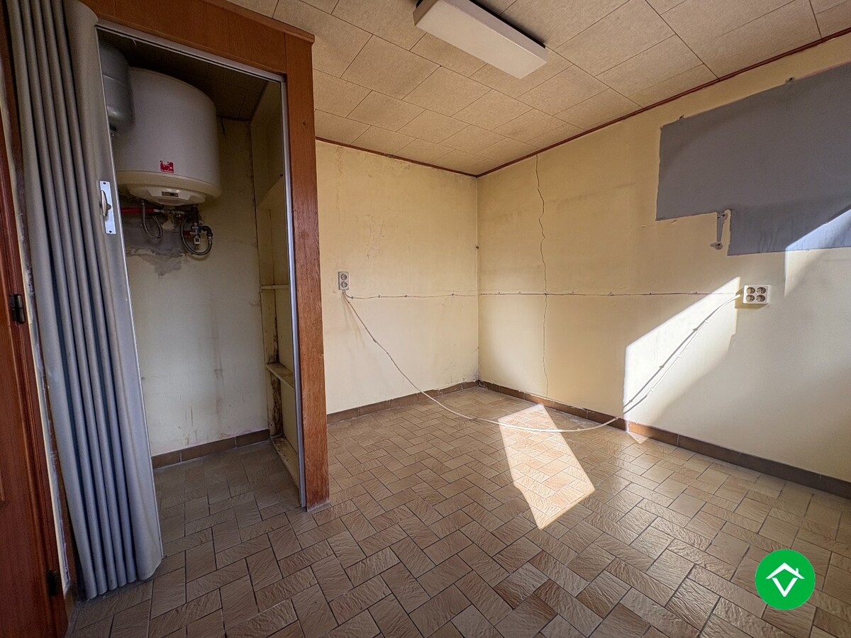 Te koop: Uniek gebouw met 2 appartementen, garage en ruime tuin – hartje Nieuwpoort-Stad 