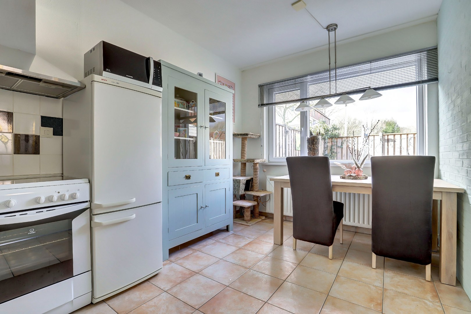 2-kamer hoekwoning met  ruime slaapkamer met airconditioning, tuin op het zonnige zuidwesten. 