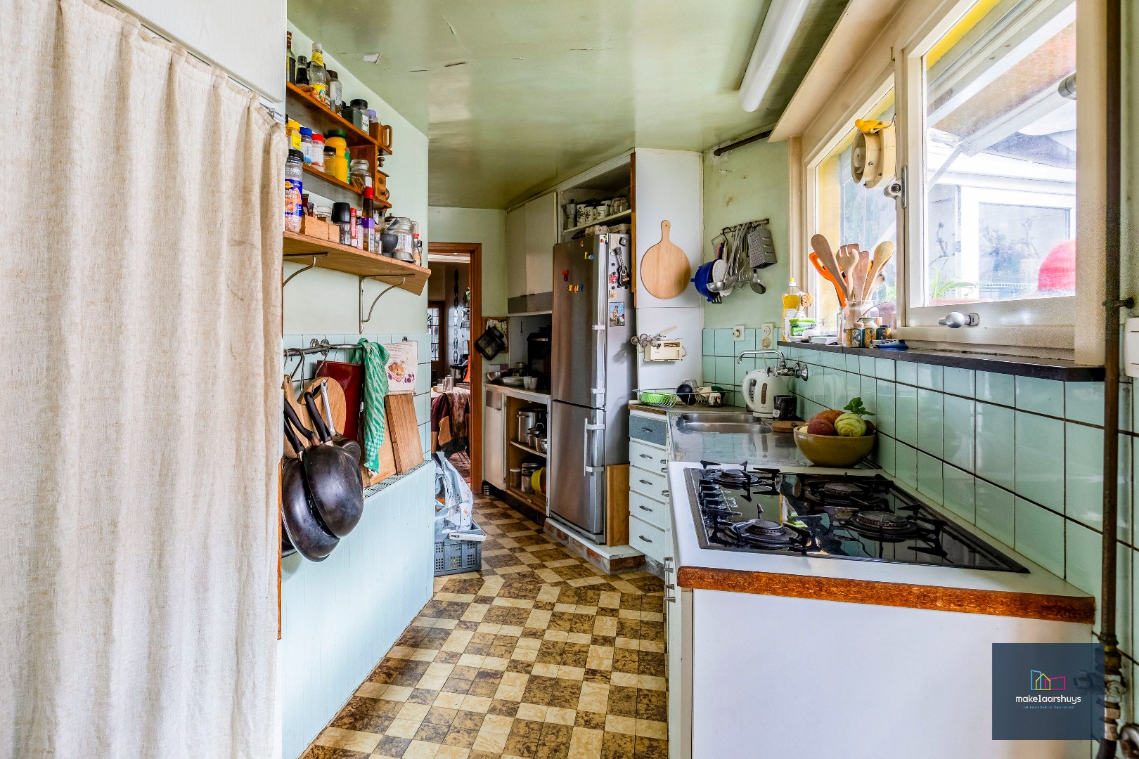 Woning met 3 slaapkamers en verrassende tuin met bijgebouwen 