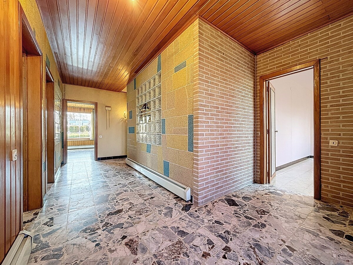 Statige laagbouwvilla met groene achteruit te Scheldewindeke 