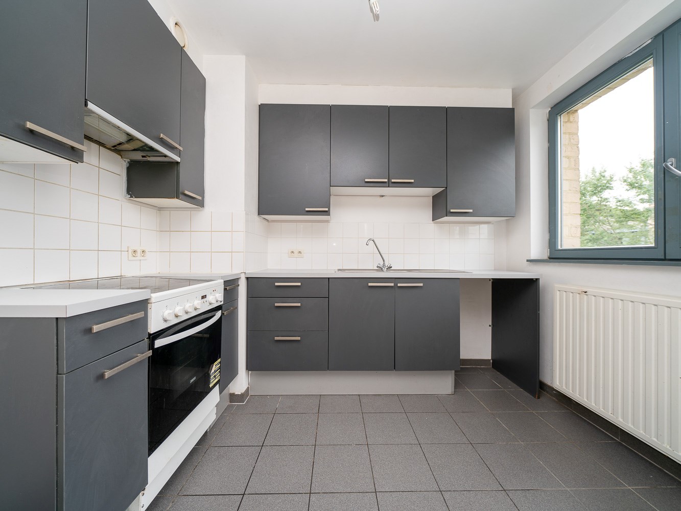 Recent 2-slaapkamer appartement met kelder 