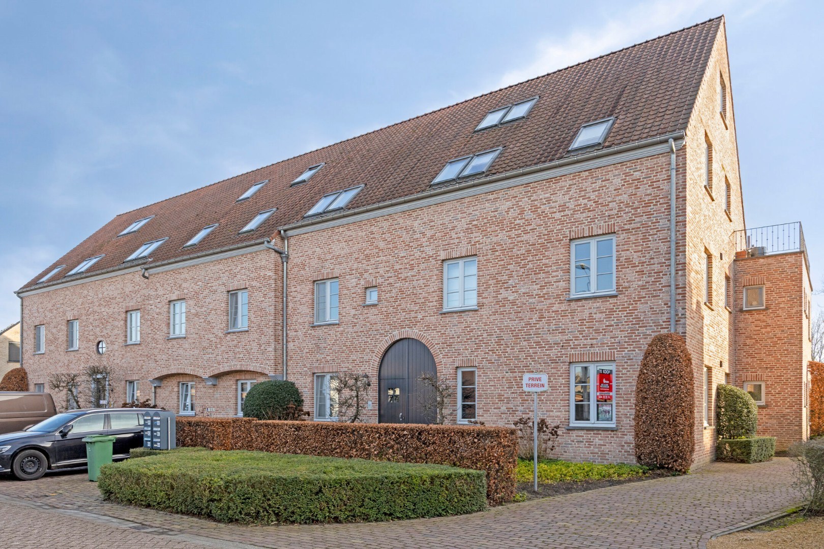 Luxueus gelijkvloers appartement met zuidgerichte tuin en garage in Tongerlo 