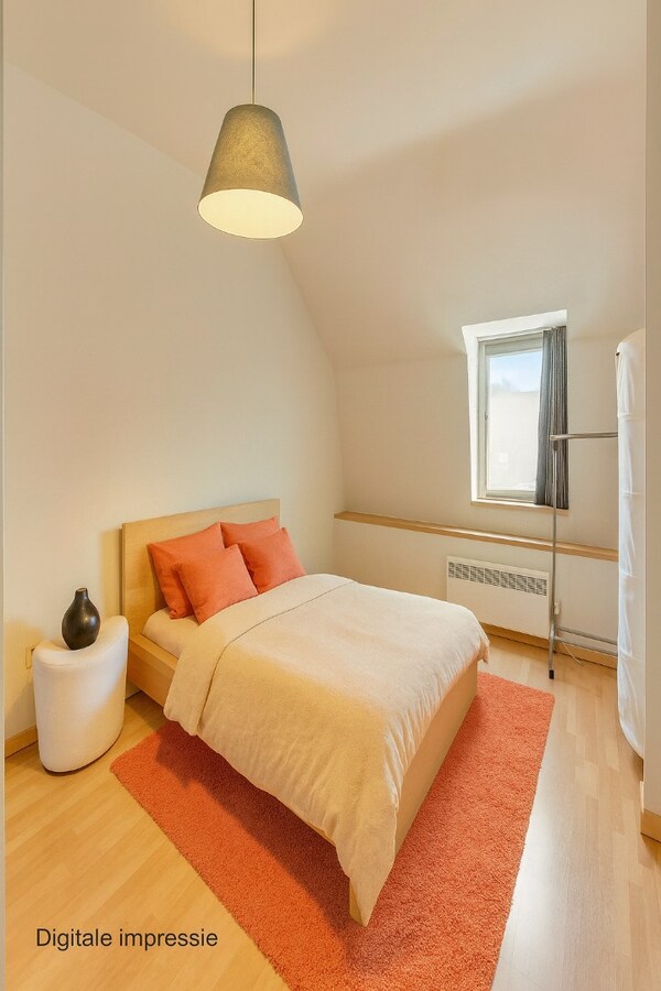 Energiezuinig 1-slaapkamerappartement met private toegang en knusse patio, centrum  Opglabbeek - interessante investeringsopportuniteit. 