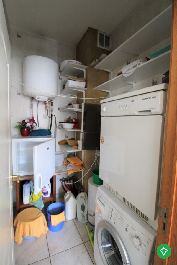 Gelijkvloers appartement met 2 slaapkamers en garage in centrum Roeselare 