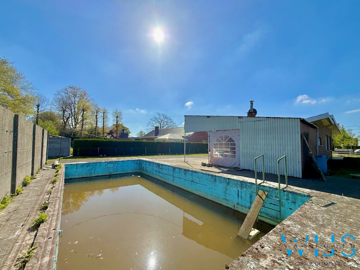 Open bebouwing op ruim perceel van 892m² te Ertvelde ! 