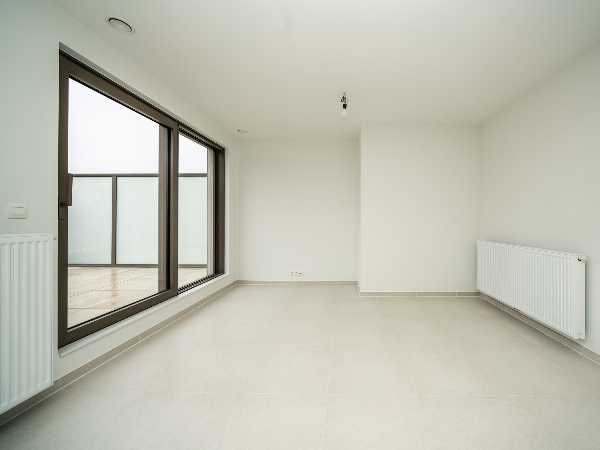 Nieuwbouw 2-kamer appartement met staanplaats en kelder 