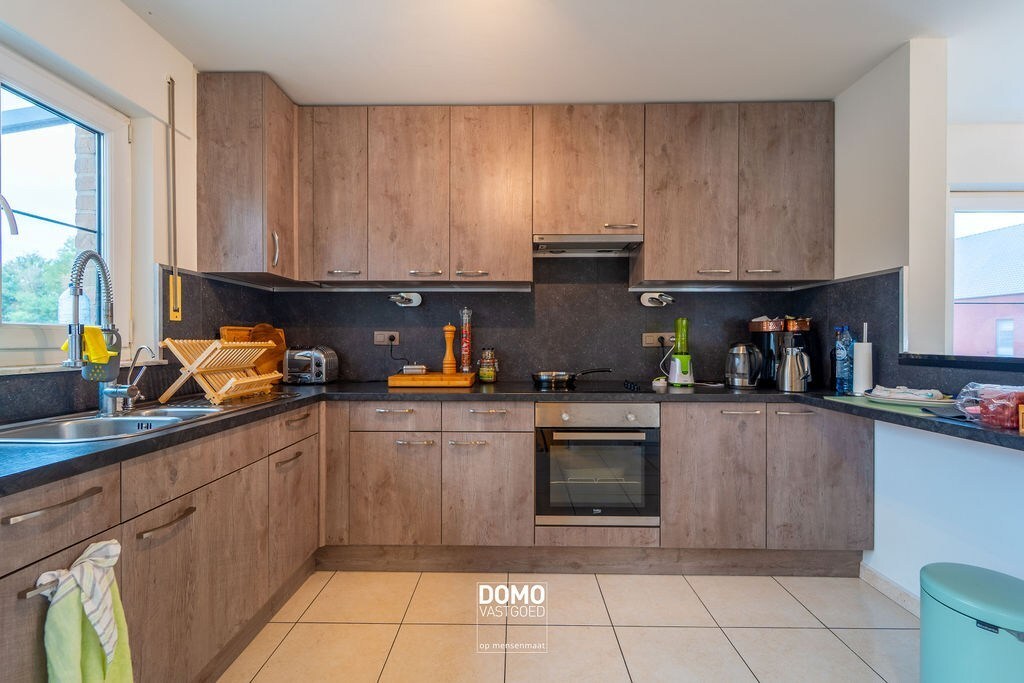 INSTAPKLAAR DUPLEXAPPARTEMENT MET TERRAS EN AUTOSTANDPLAATS IN HEUSDEN-ZOLDER 