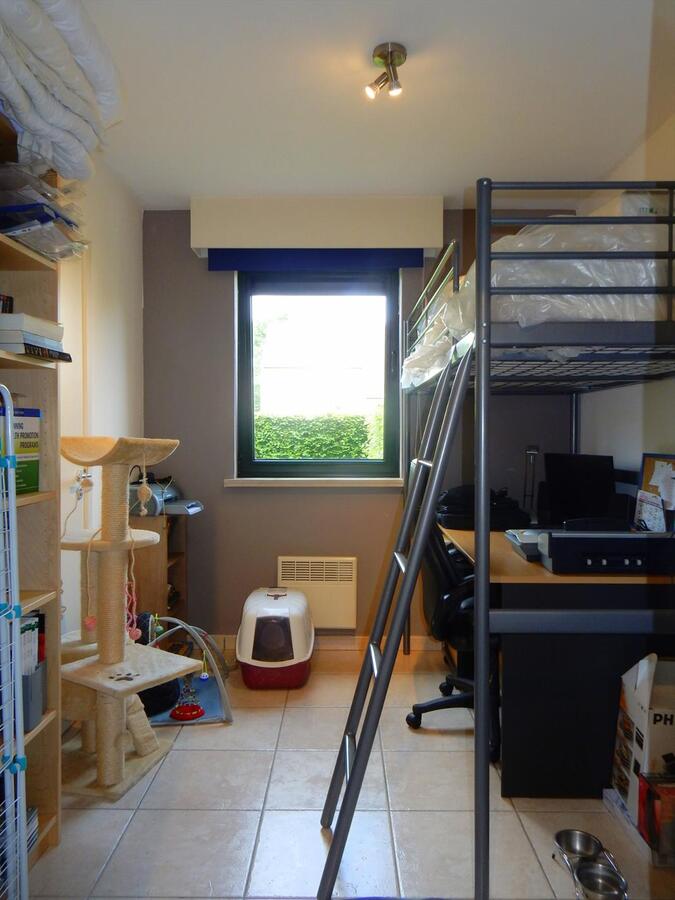 Gezellig gelijkvloersappartement met zonnige tuin en garage 