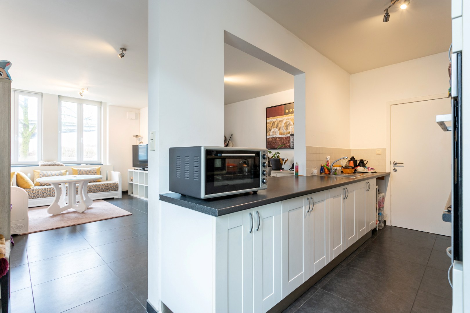 Opbrengsteigendom te koop met 3 app (+-100m²) én garagebox 