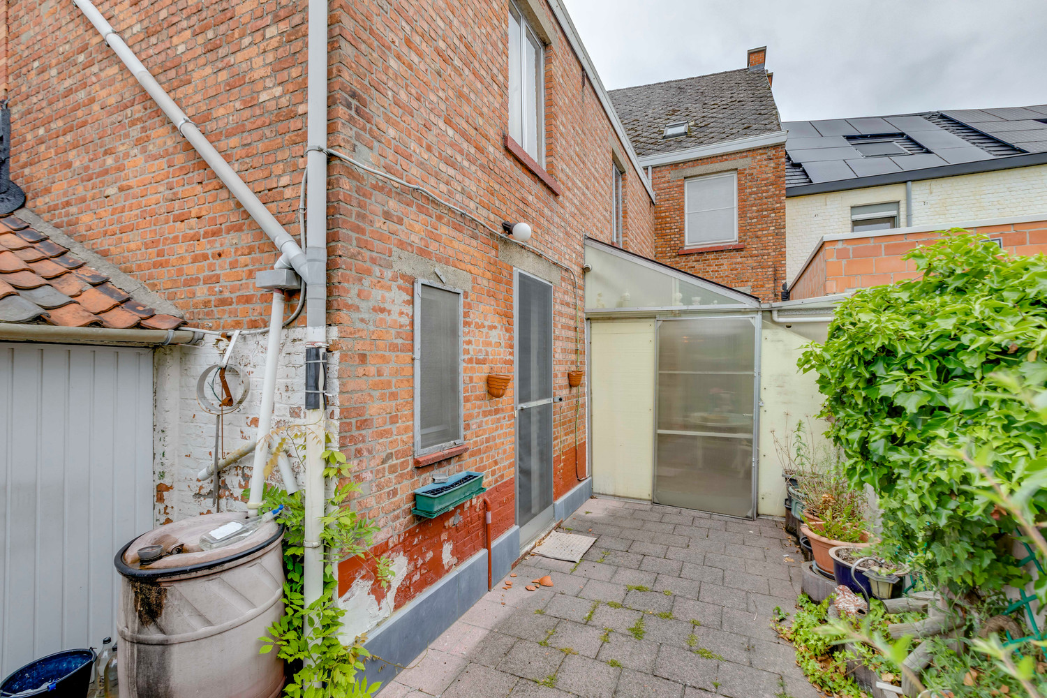 Buitenkans: rijwoning met tuin te Serskamp 