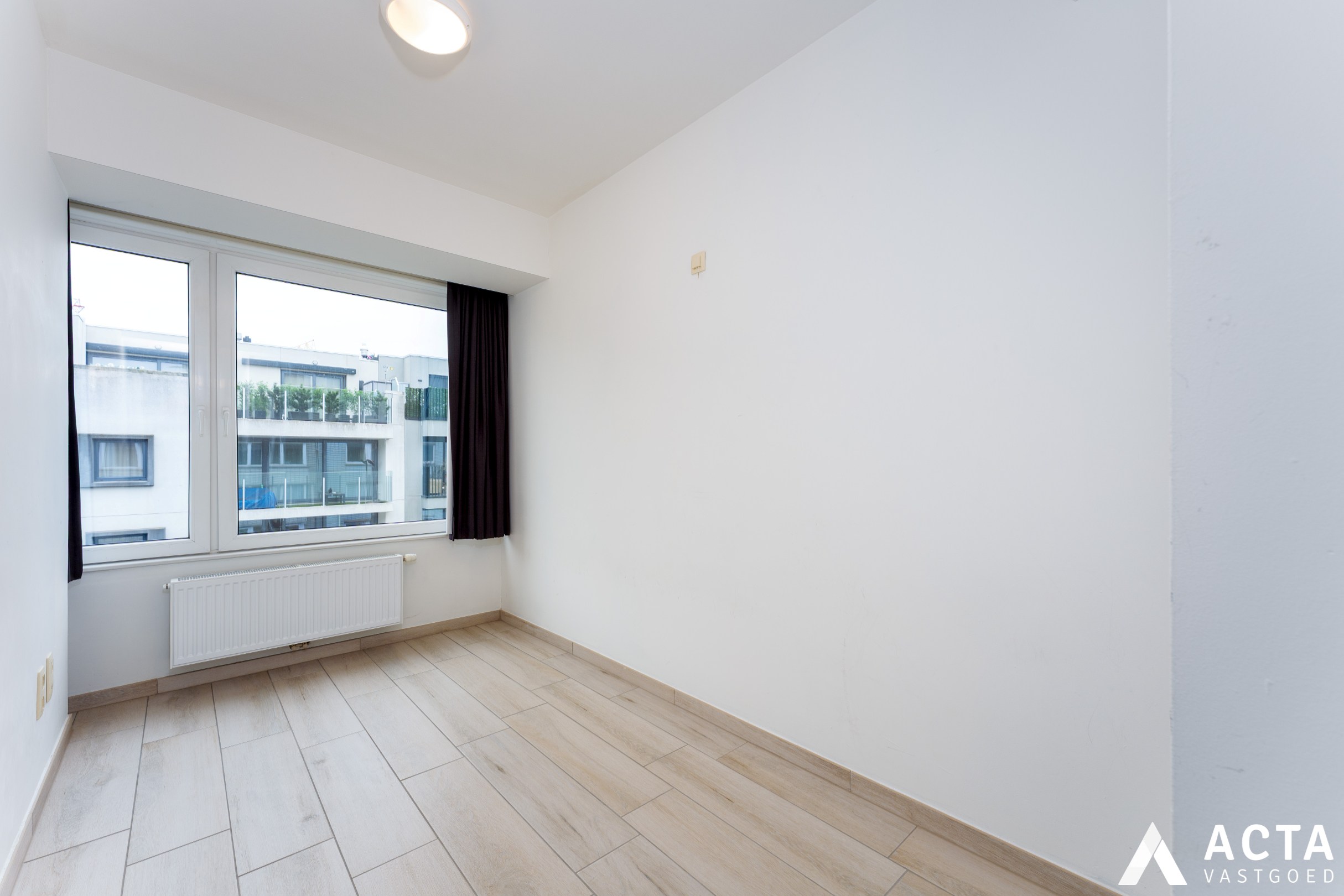 Instapklaar appartement met twee slaapkamers en parkzicht. 