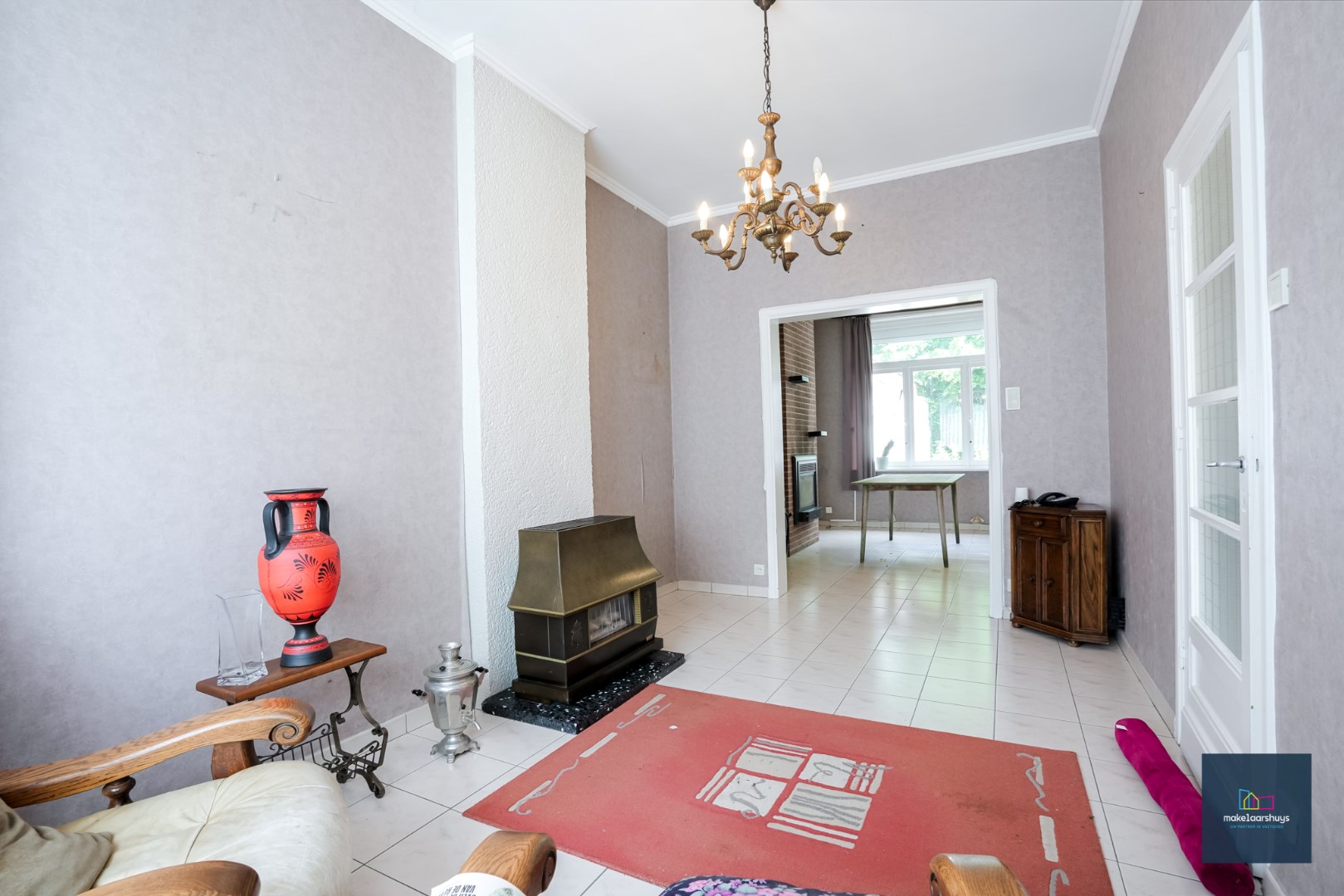 Centraal gelegen te renoveren woning in rij met tuin te Mariakerke 