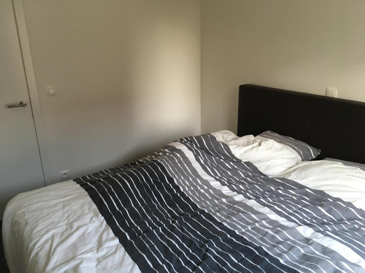 Modern, eigentijds 2 slaapkamer appartement met ondergrondse autostaanplaats 