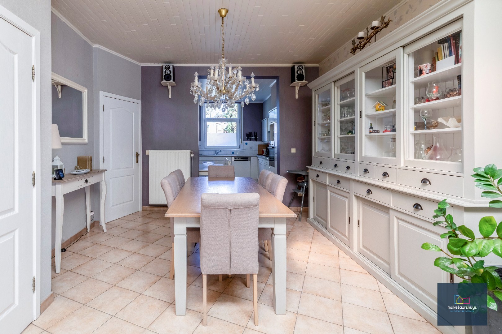Goed onderhouden en ruime woning in rij met tuin/terras te Wondelgem 