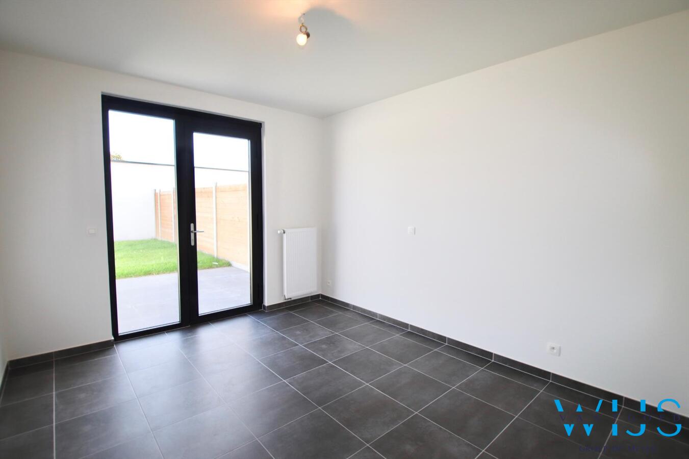 Gelijkvloers appartement met TUIN &amp; GARAGE te Zelzate! 