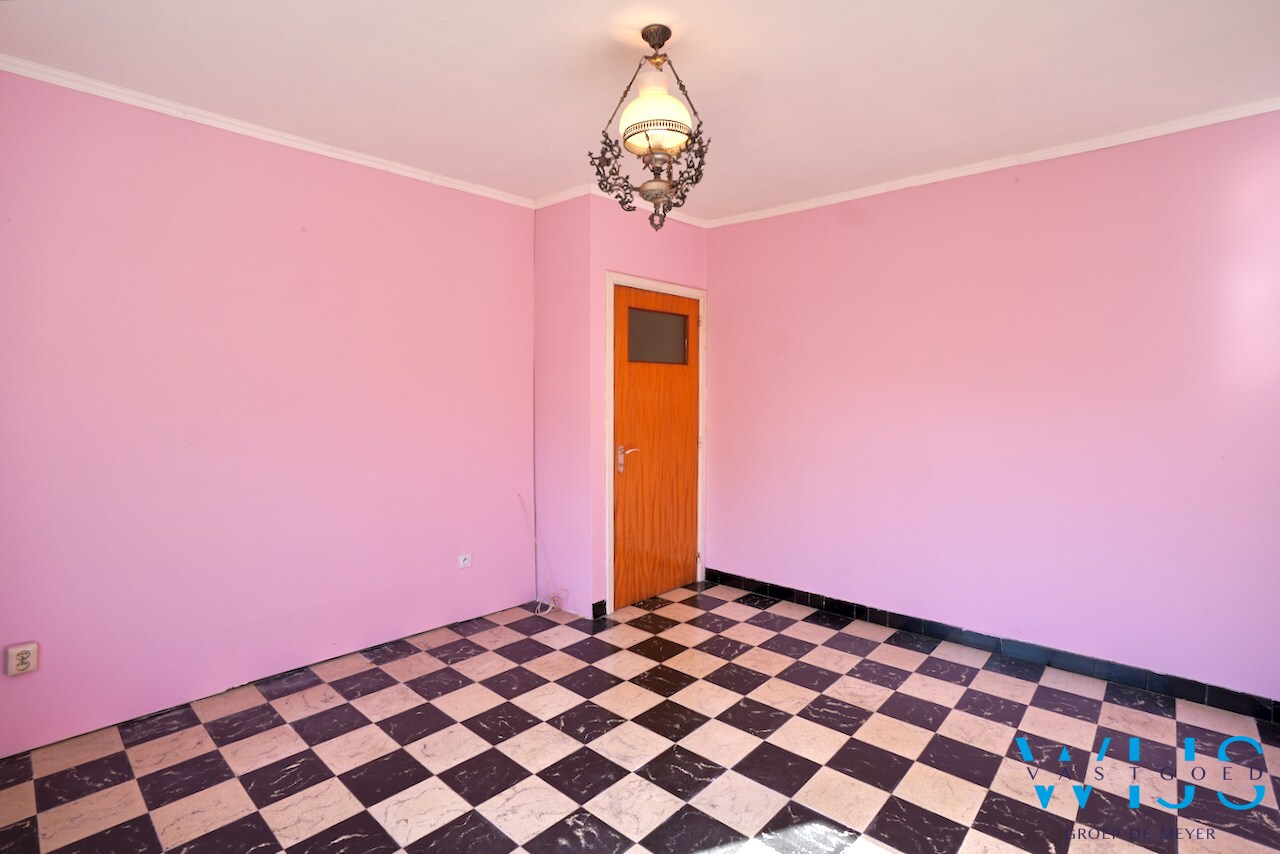 Open bebouwing op ruim perceel van 892m² te Ertvelde ! 