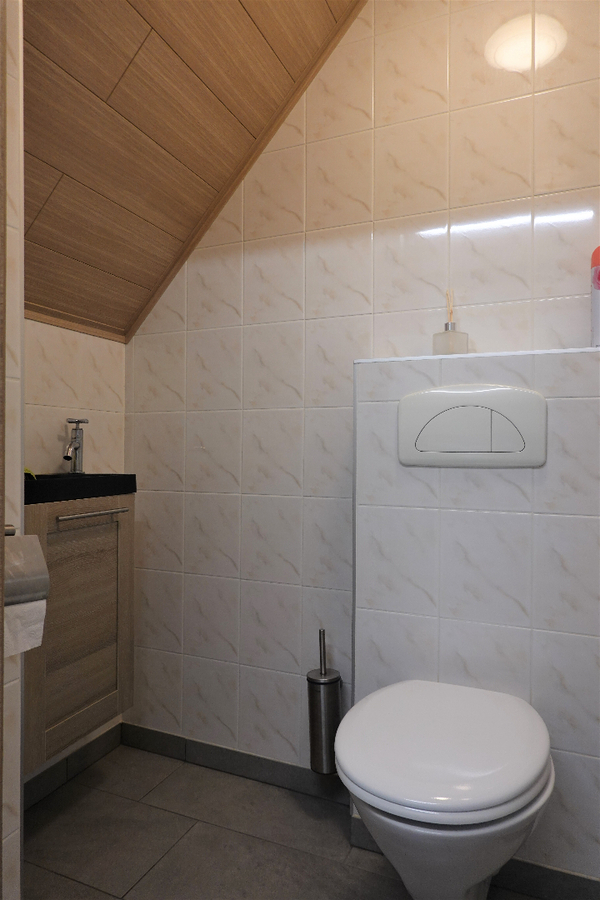 Knusse woning met grote tuin 