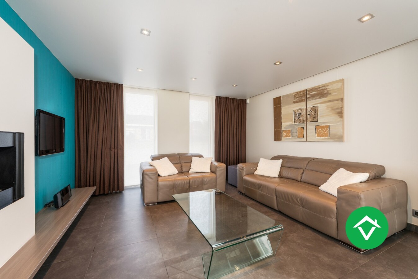 Alleenstaande woning met 4 slaapkamers en garage te Aartrijke 