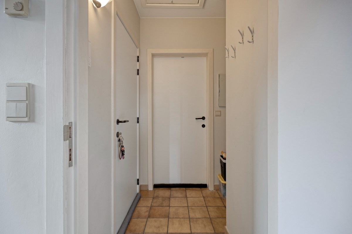 Opbrengsteigendom met 3 appartementen en 7 garages 
