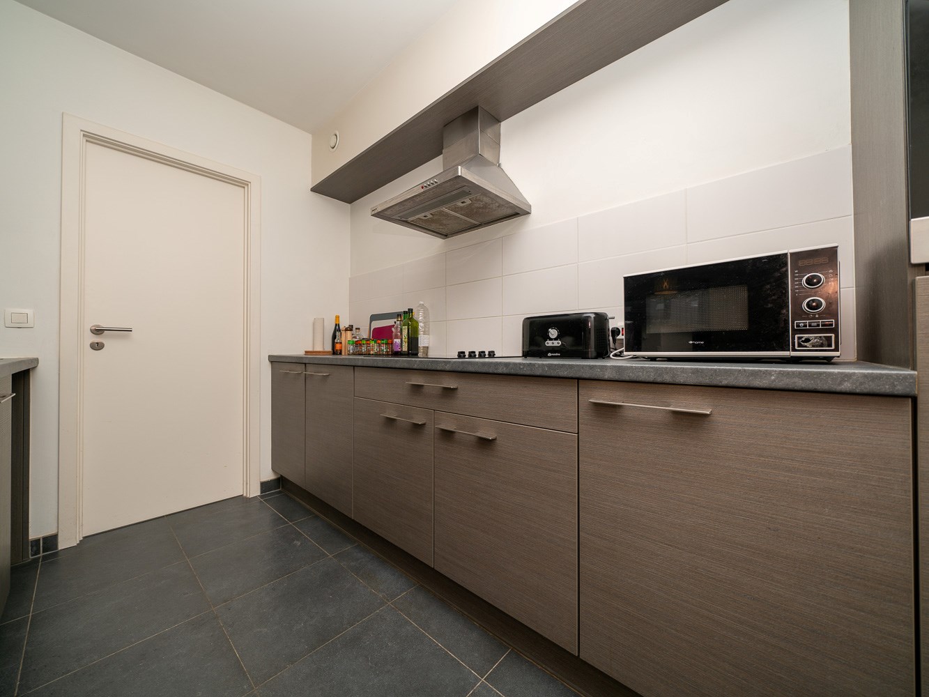 Recent 1-kamer appartement met terras, staanplaats, kelder 