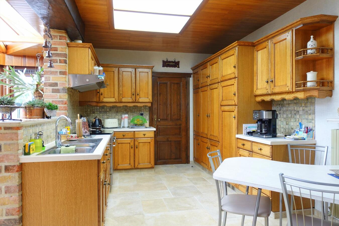 Uitzonderlijke woonst met werkplaats 