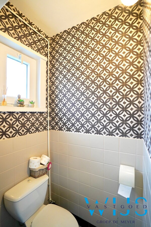 Toffe gezinswoning met garage in het CENTRUM VAN ERTVELDE ! 