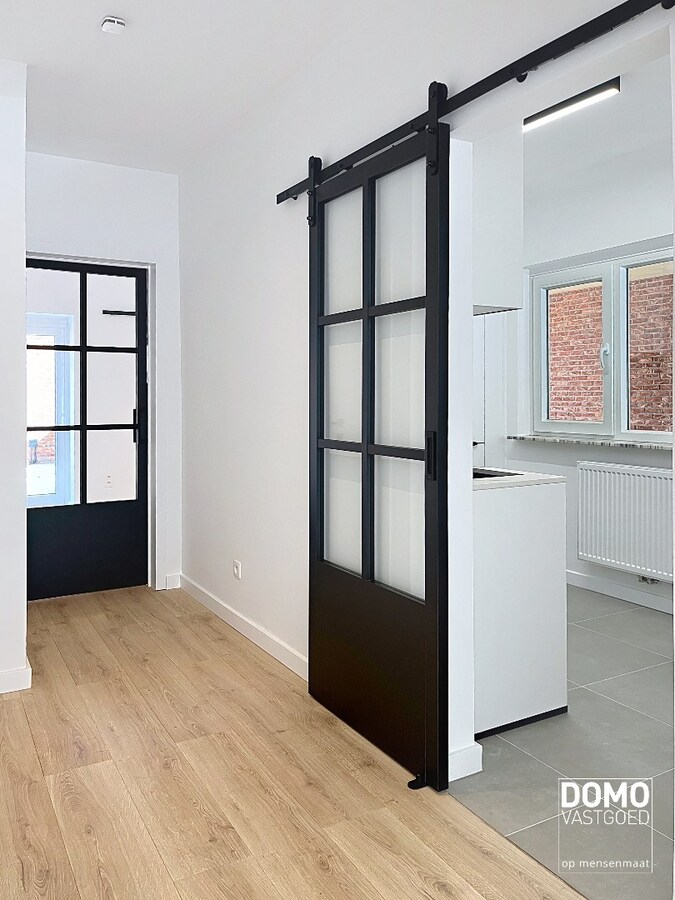 VOLLEDIG GERENOVEERD APPARTEMENT MET TERRAS EN GARAGE TE HASSELT 