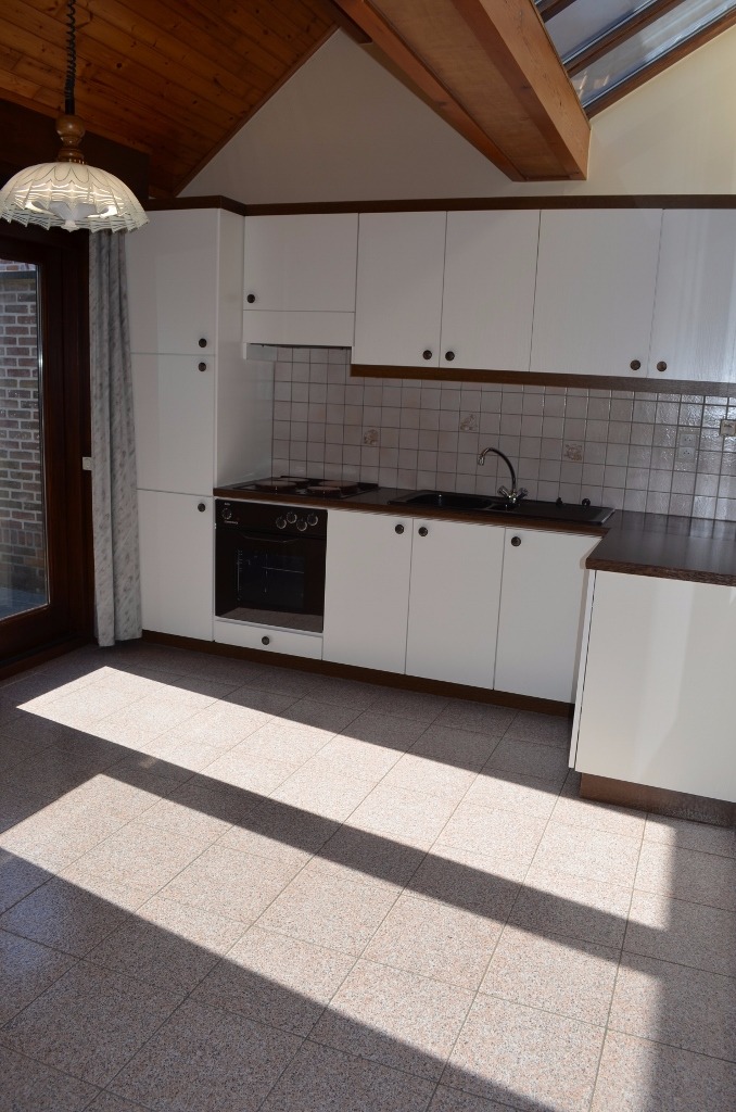 Rijwoning met 2 slpks en tuin te Adegem 
