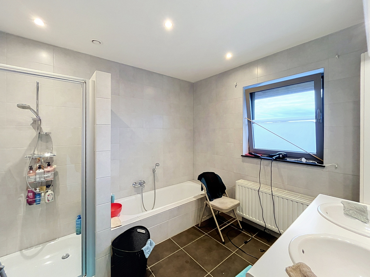 Instapklare halfopen woning met tuin 