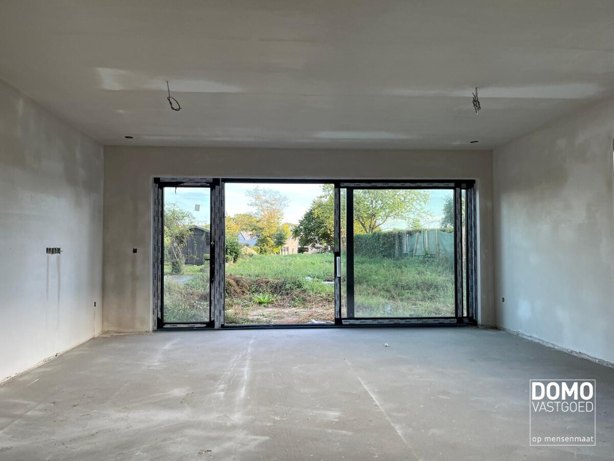 GELIJKVLOERS NIEUWBOUWAPPARTEMENT MET TUIN IN HASSELT 