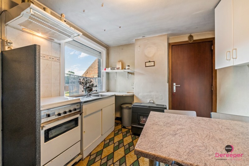 Alleenstaande woning met bijgebouwen en prachtig landelijk uitzicht 