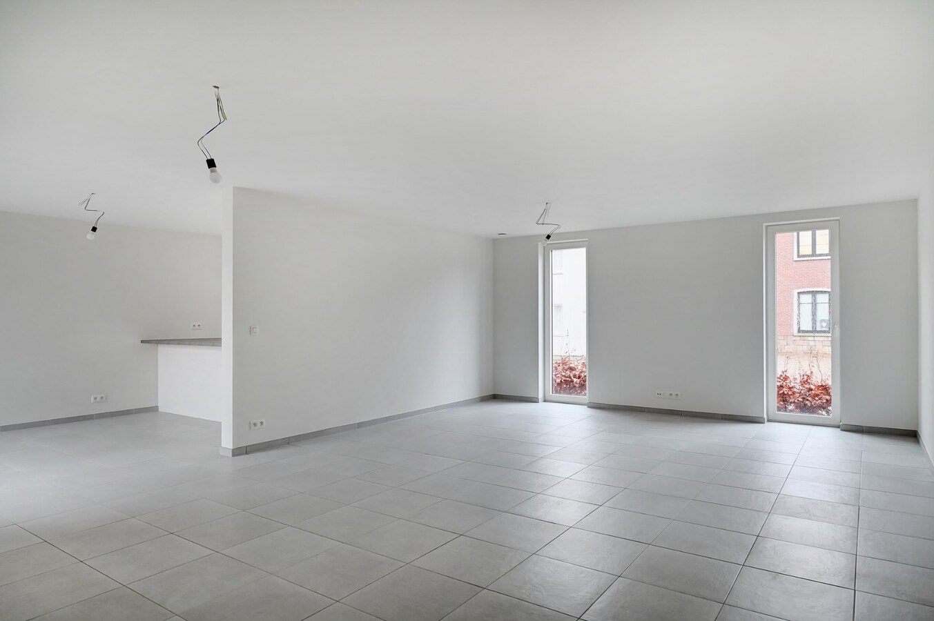 6% BTW MOGELIJK Gelijkvloers appartement met terras, lift en ondergrondse staanplaats 