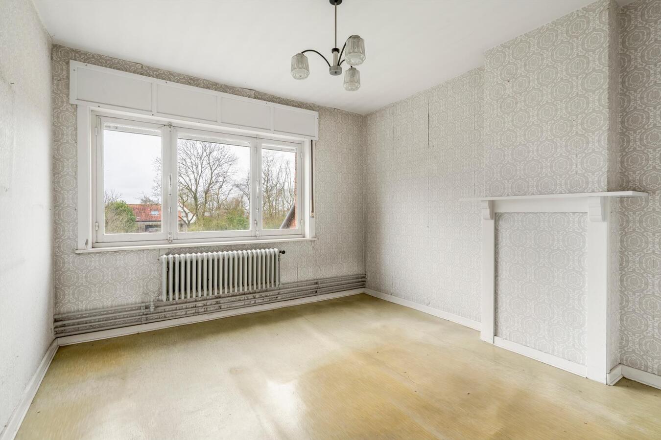 Rustige gelegen open bebouwing met bouwgrond op 1780 m² te Koekelare 