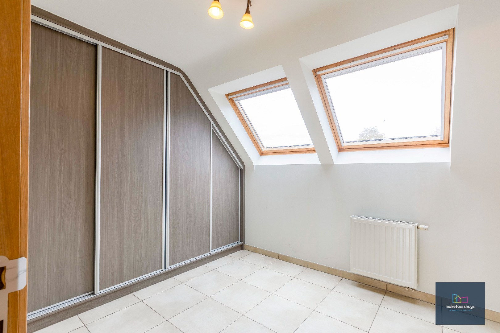 VERKOCHT Gunstig gelegen en energiezuinig appartement met zonneterras en garagebox 