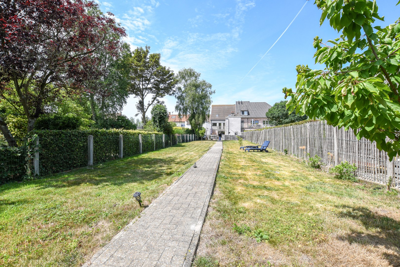 Ruime bel-etagewoning met tuin en bijgebouw, vlakbij centrum De Haan 