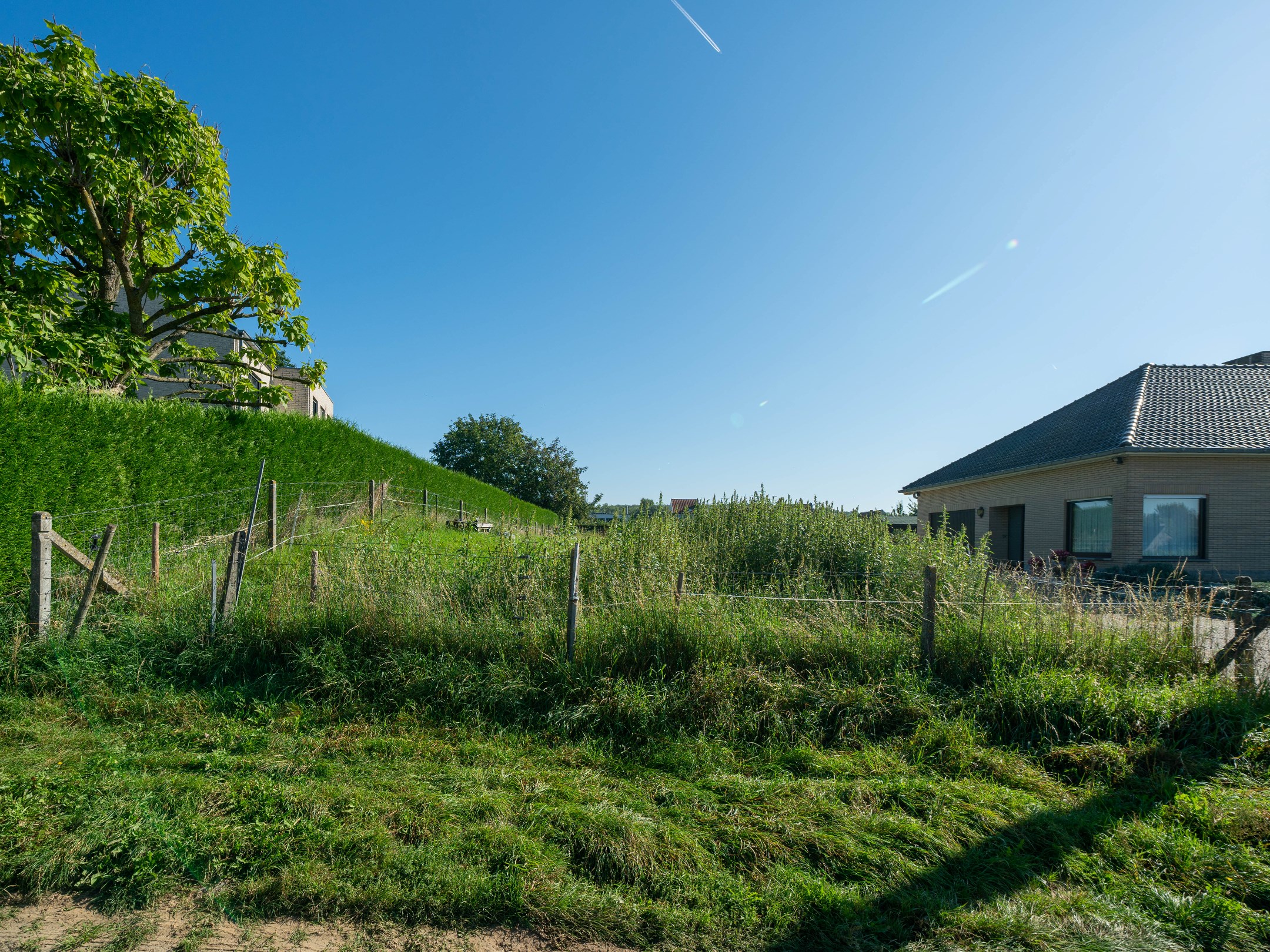 Residentieel gelegen bouwgrond (9a 57ca) voor een 4-gevel 