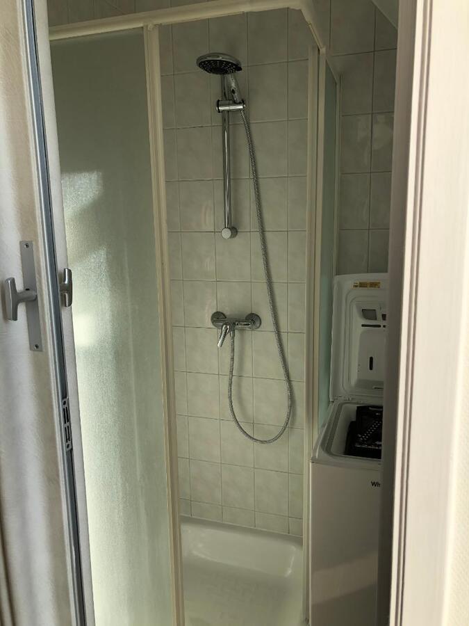 Tijdloos dakappartement met bijzonder ruim terras in centrum Gavere 