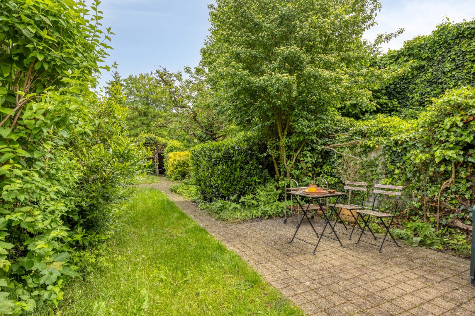 Ruime stadswoning met achteruitgang via Janseniusstraat met 4 slaapkamers, garage en tuin te Leuven- EPC 239kwh/m2 