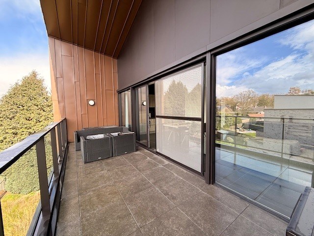 Nieuwbouwappartement met 1 slaapkamer, terras en autostandplaats te Maasmechelen. 