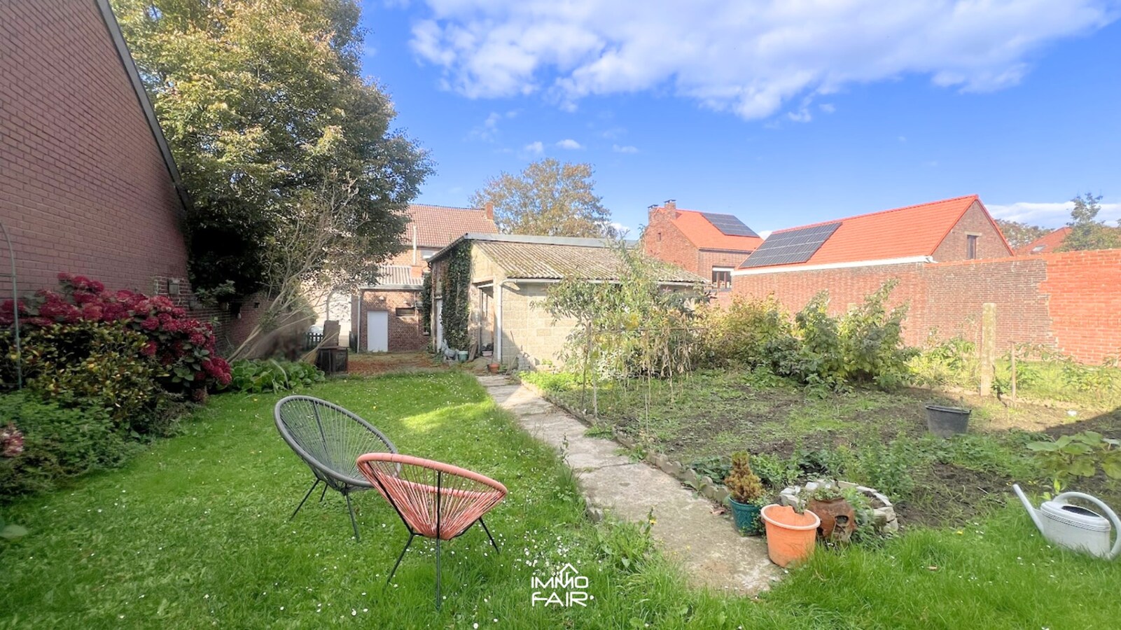 Budgetvriendelijke woning op royaal perceel! 