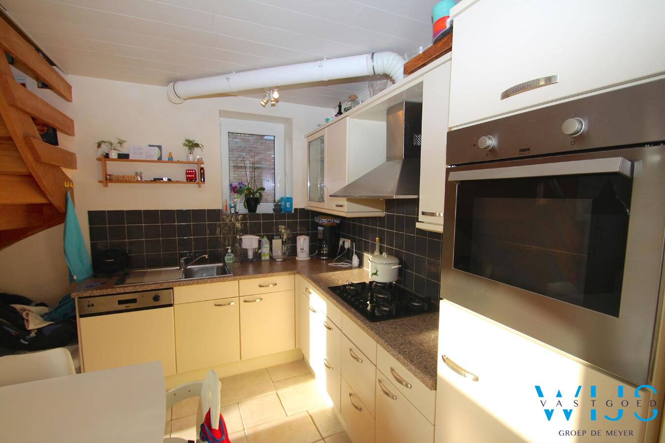 Knusse, instapklare starterswoning te Drongen ! 