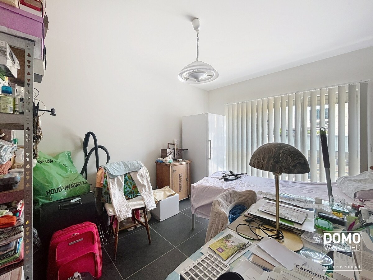 RUIM APPARTEMENT VAN 120 M² MET TERRAS, LIFT, 2 SLAAPKAMERS EN AUTOSTANDPLAATS GELEGEN TE CENTRUM KERMT 