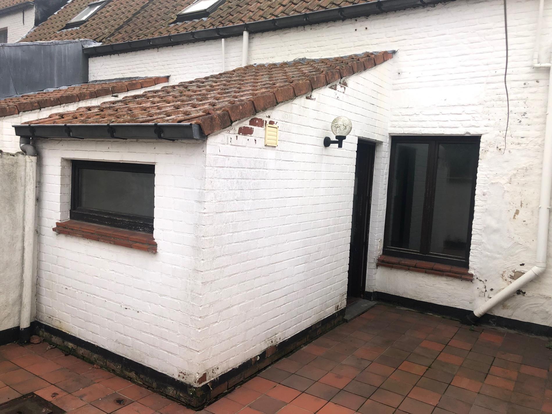 Gezellige rijwoning met 1 slpk en koertje 