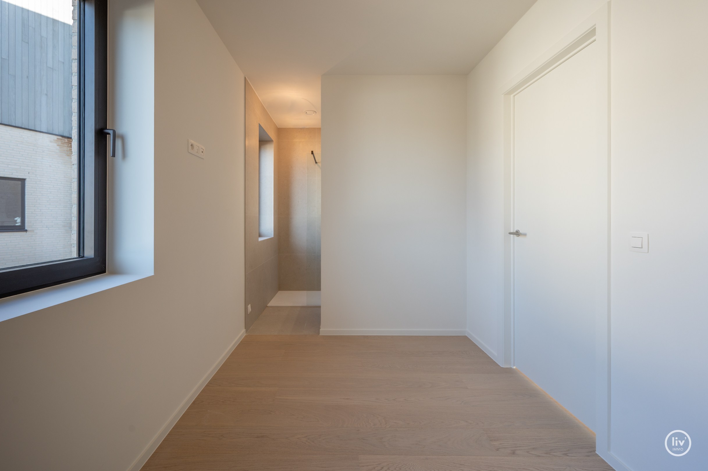Centraal gelegen nieuwbouw-appartement in de residentie Maurice (met mogelijkheid tot aankoop van een inpandige autostaanplaats). 