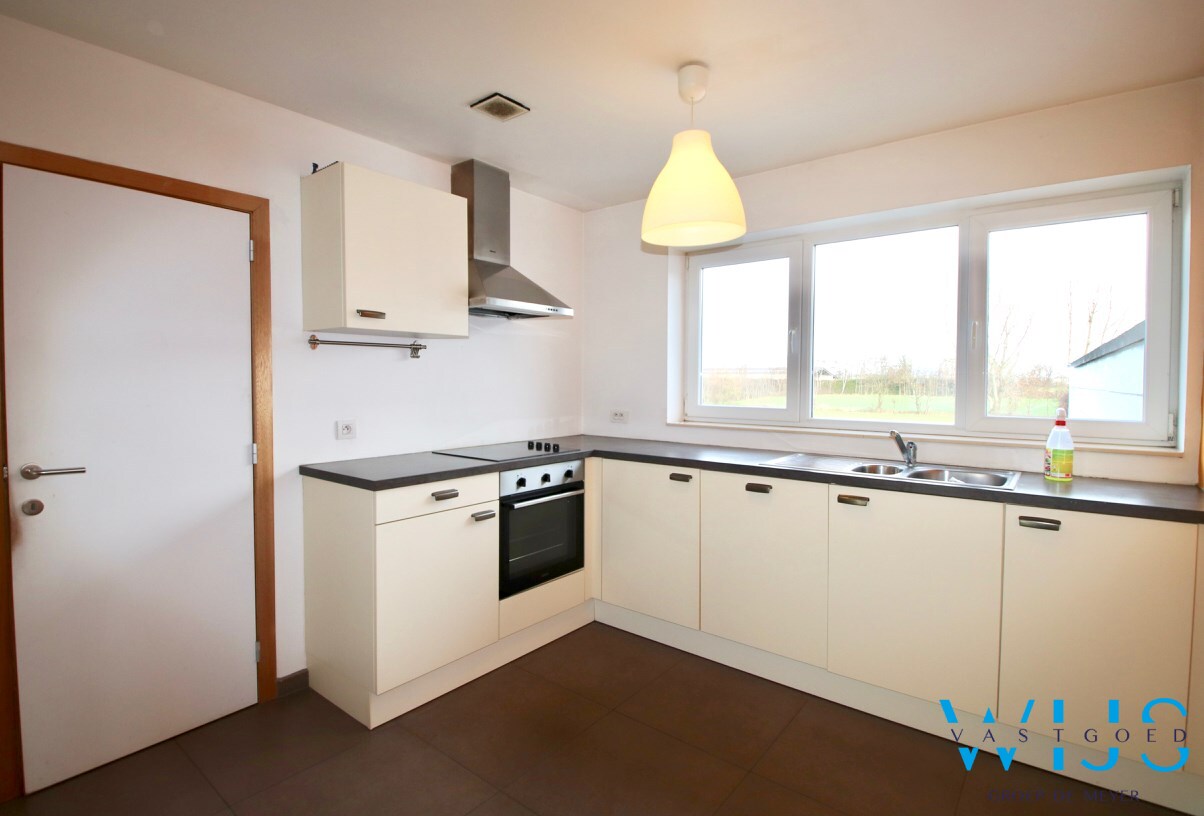 Energiezuinig 2 slaapkamerappartement met garage te Rieme! 