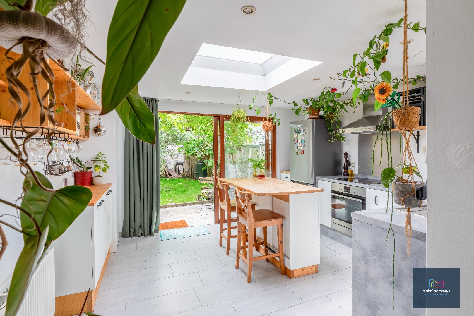 Instapklare woning met zuidgerichte tuin nabij centrum Gent 