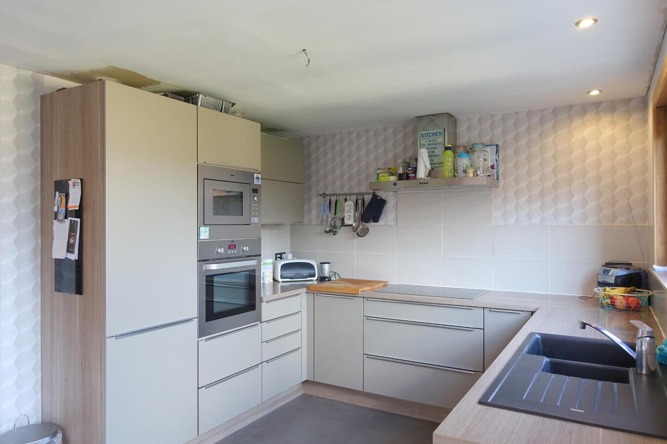 Zonnige charmante half-open woning 